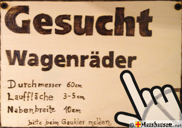 Schild Suche nach neuen Wagenrädern für das Mäuseroulette